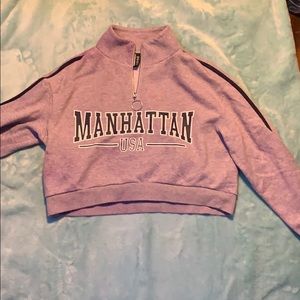 manhattan logo cropped quarter zip sweater.